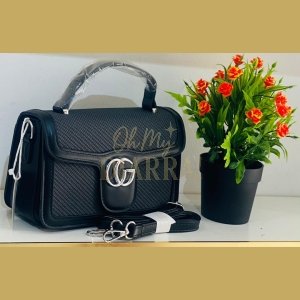 Sac à main Gucci GG Marmont en tissu et cuir